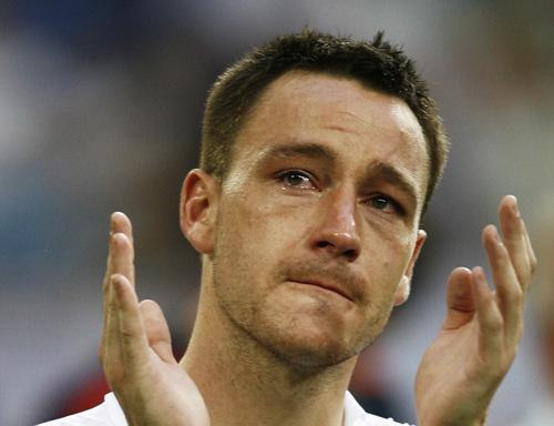England's John Terry acknowledges the crowd after Portugal defeated England in their World Cup 2006 quarter-final soccer match in Gelsenkirchen
